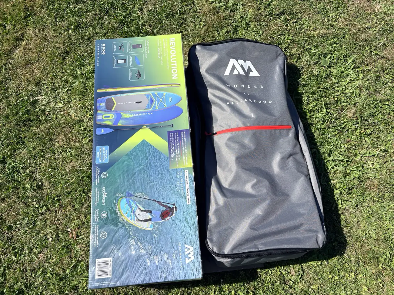 Costco Aqua Marina Revolution retail box beside the included CIRCUPACK carry backpack